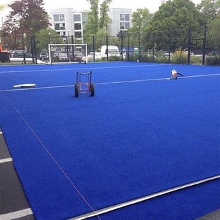 Rumput buatan biru untuk gelanggang tenis dayung